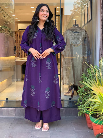 Elegant Plum Kurta Set with Floral Motifs